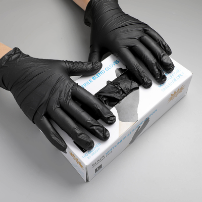 Guantes de tatuaje negros de 100pcs Guantes de nitrilo desechables libres de polvo